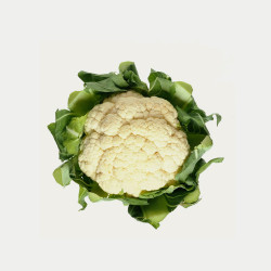 White cauliflower with green leaves